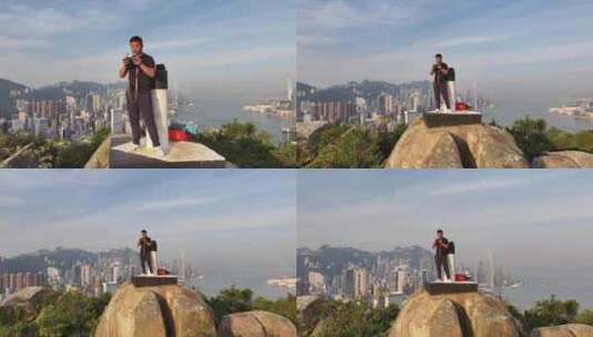 站在香港宝马山顶自拍高清在线视频素材下载