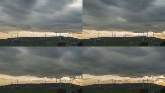 航拍山顶风力发电风车转动云层延时高清在线视频素材下载