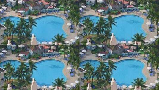 航拍旅游度假区蓝色游泳池高清在线视频素材下载