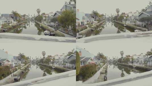 洛杉矶汽车经过水边的桥梁房屋高清在线视频素材下载