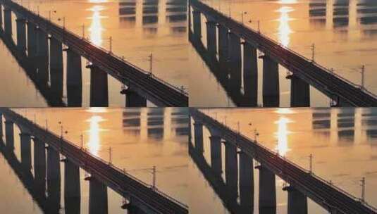 黄昏夕阳下的跨江火车大桥高清在线视频素材下载