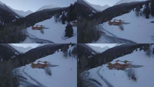 无人机拍摄冬天山里的房子高清在线视频素材下载