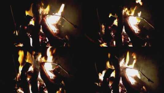 燃烧的树枝的光用作火的木材高清在线视频素材下载