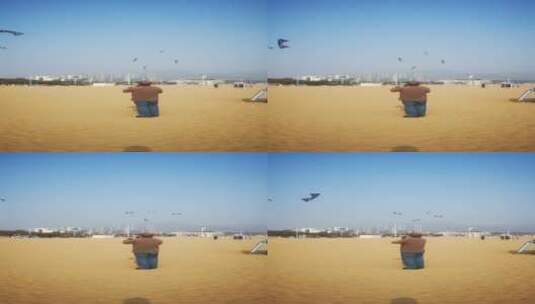 实拍大海沙滩放风筝高清在线视频素材下载