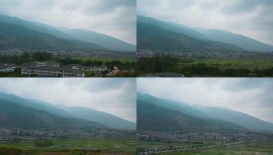 山脚下的城市视频云南大理喜洲乡镇航拍高清在线视频素材下载