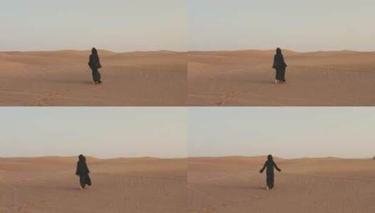 妇女赤脚在沙漠中行走的背影高清在线视频素材下载