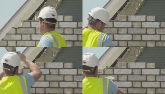 建筑工人烈日下切砖认真工作高清在线视频素材下载