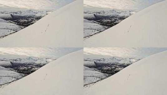 远景-一群登山者正在爬向雪山高清在线视频素材下载