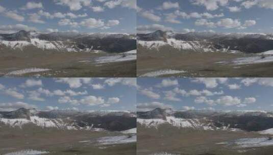 新疆 航拍 高原 雪山 山脉 蓝天 草地高清在线视频素材下载