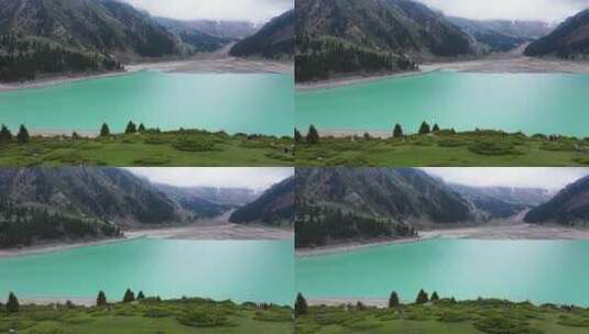 航拍小湖山谷的自然美景高清在线视频素材下载
