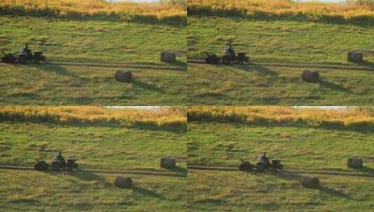 额尔古纳乡村农民驾驶拖拉机收割牧草高清在线视频素材下载