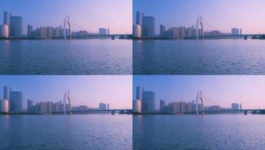 清晨日出旭日阳光照耀在广州珠江猎德大桥高清在线视频素材下载