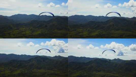 飞越山脉的跳伞运动员高清在线视频素材下载