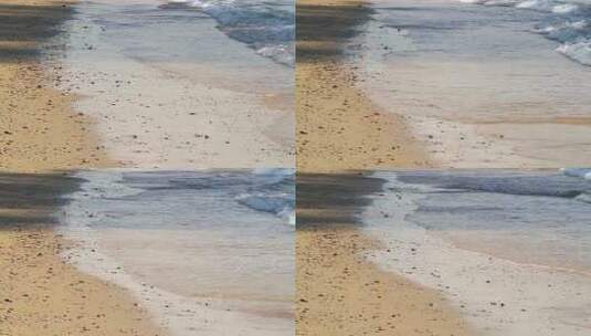 肮脏海滩上的浅浪高清在线视频素材下载