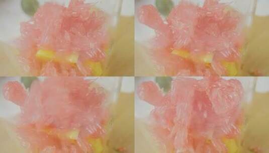 调饮料芒果西米露加入西柚果粒高清在线视频素材下载