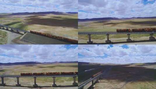 航拍可可西里高原上行驶的火车高清在线视频素材下载