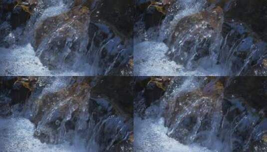 山泉溪水冲刷溪石高清在线视频素材下载
