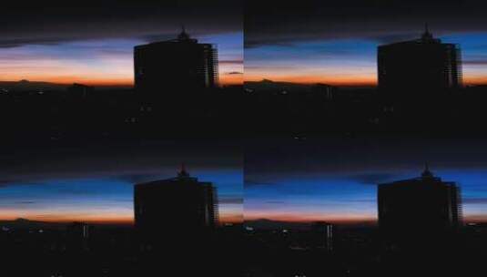 广州夕阳晚霞与城市高楼建筑剪影延时风光高清在线视频素材下载