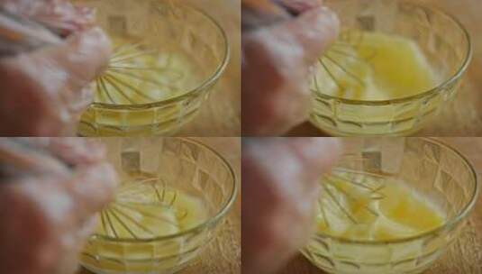 厨师搅动鸡蛋液的特写镜头高清在线视频素材下载