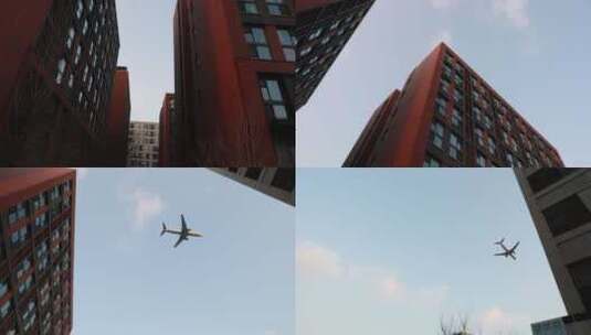 飞机楼顶飞过高清在线视频素材下载