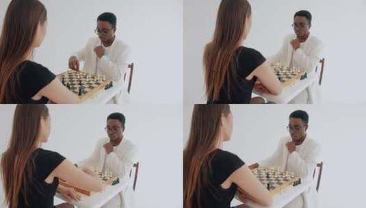 女人正在和男人下棋高清在线视频素材下载