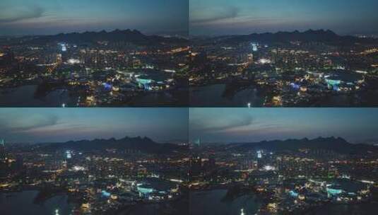 航拍山东青岛海边城市灯光夜景高清在线视频素材下载