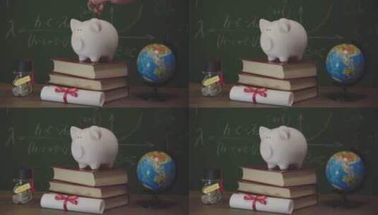 桌子上的储存罐小猪为孩子储存教育资金高清在线视频素材下载