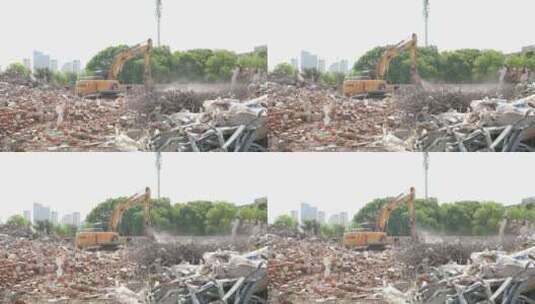 挖掘机在拆除建筑垃圾高清在线视频素材下载