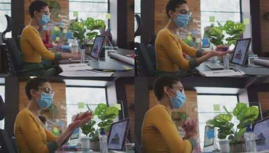 妇女戴着口罩在办公室用洗手液高清在线视频素材下载
