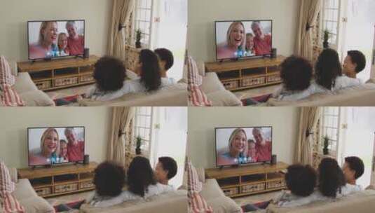 两家人在电视上进行视频通话高清在线视频素材下载