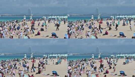海南三亚白沙滩上旅游度假的游客高清在线视频素材下载