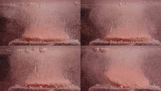 泡腾片在水中溶解溶化泡发高清在线视频素材下载