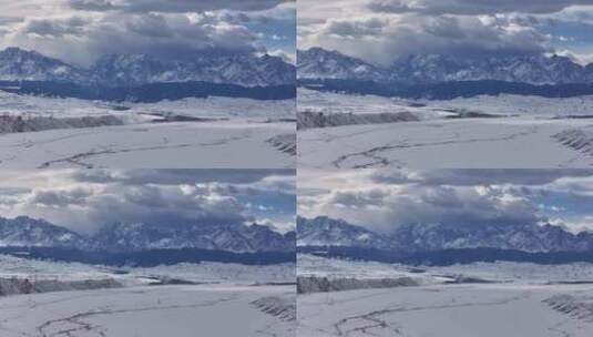 航拍冬季新疆旅游阿勒泰安集海雪山壮丽风景高清在线视频素材下载