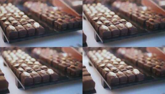商店托盘上的黑巧克力展示高清在线视频素材下载