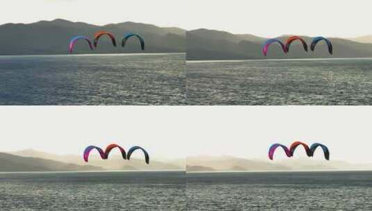 长焦无人机围绕风筝冲浪帆旋转，风筝冲浪帆高清在线视频素材下载