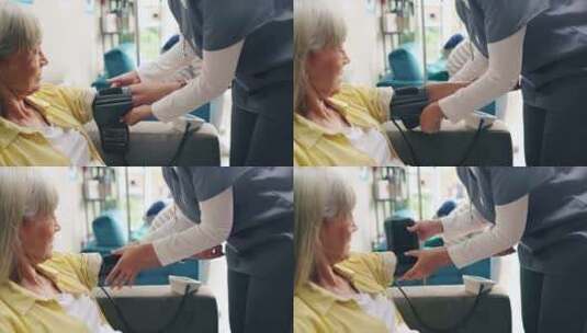 妇女、护士和病人在医院用血压机测量心率或高清在线视频素材下载
