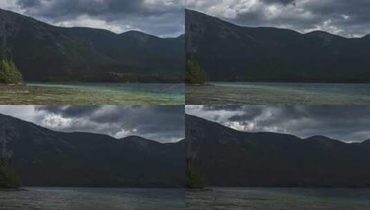 多云多风的日子里山边的湖时间流逝高清在线视频素材下载