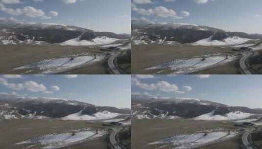 新疆 航拍 树林 高原 草地 雪山 山脉 白云高清在线视频素材下载