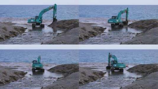在岸边工作的挖土机高清在线视频素材下载