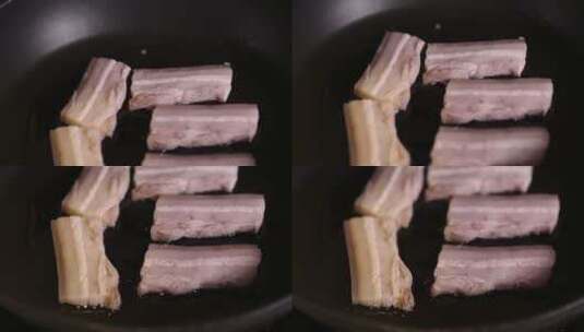 平底锅炒制小米粉蒸排骨原料高清在线视频素材下载