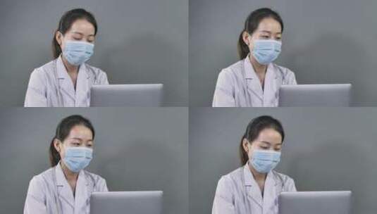 亚洲中国人女性女医生记录病情工作场景高清在线视频素材下载