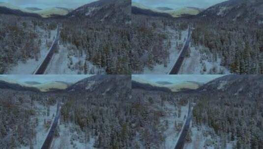 鸟瞰冬季雪山林海公路行车高清在线视频素材下载