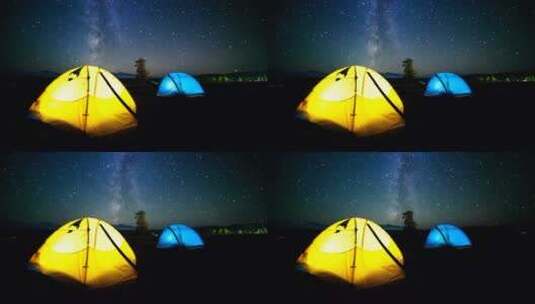 五颜六色的灯光帐篷_夜空和星星的时间流逝高清在线视频素材下载
