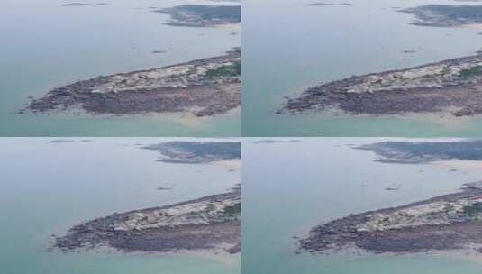 旅游景区福建湄洲岛海边风化礁石竖屏航拍高清在线视频素材下载