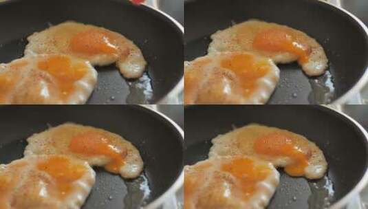 人让蛋黄在煎锅上倒出烹饪鸡蛋高清在线视频素材下载