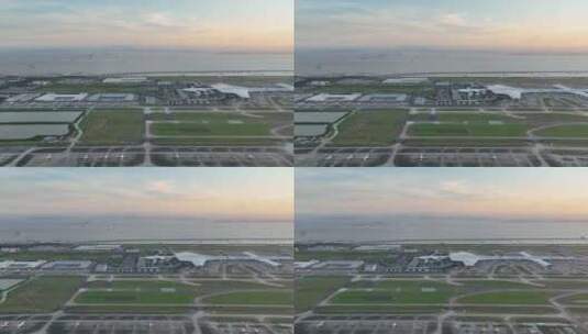 高空俯瞰深圳宝安机场：总体造型如深海飞鱼高清在线视频素材下载