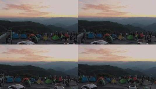 山村户外大量人群帐篷露营看日出航拍高清在线视频素材下载