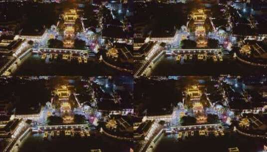 中国江苏南京秦淮河上穿梭的游船夜景航拍高清在线视频素材下载