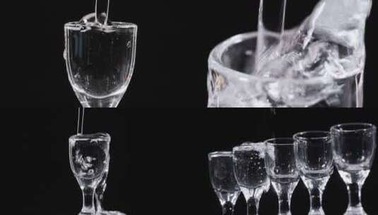 白酒倒酒酒杯酒水碰杯干杯酒广告素材高清在线视频素材下载