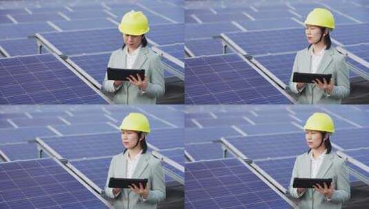 女性工程师在屋顶光伏太阳发电厂工作高清在线视频素材下载